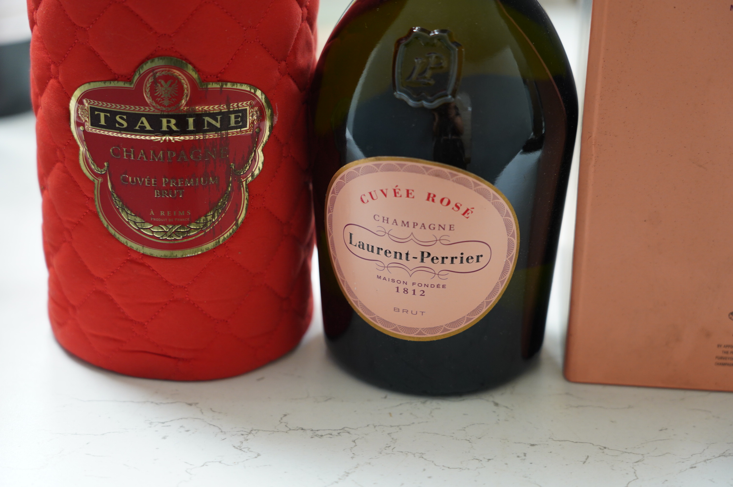 A bottle of Moet & Chandon champagne, two bottles of Laurent Perrier champagne and one other (4). Condition - fair to good